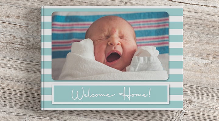 Baby photobook with quote welcome home