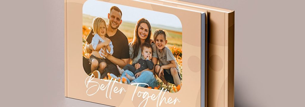 Picture of family on photobook with quote better together