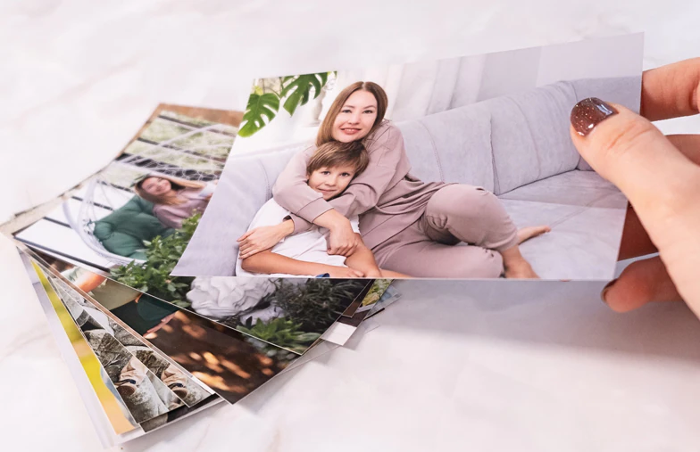 Stack of custom photo prints from the Printerpix online photo printing service