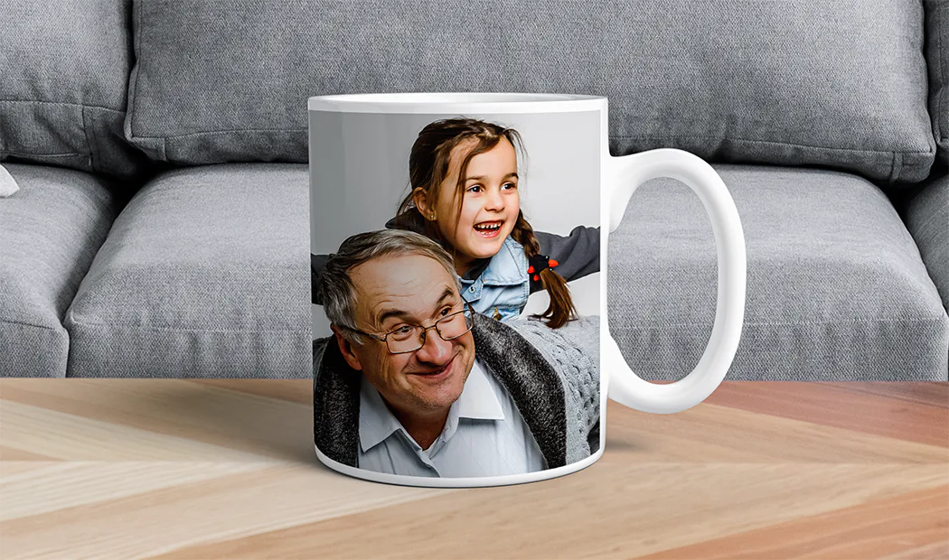 Mum and baby holding Printerpix cartoon design custom mug with dad text