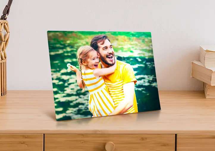 Metal photo print of mom and daughter on bookshelf