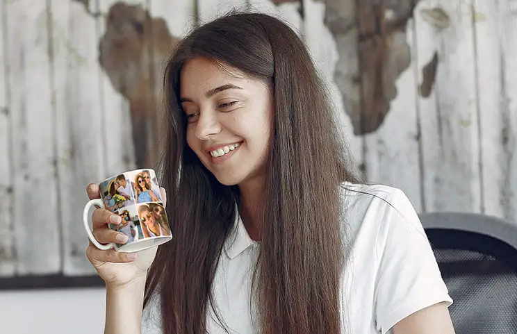 Girl holding mug with photo collage design of couple photos