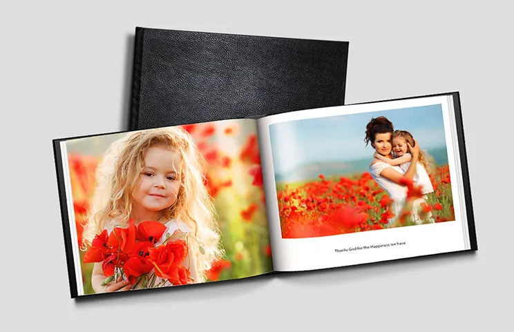 Leather Personalised Photo Books by Printerpix|Custom Printerpix photo book with leather cover and personalised design|Custom made photo album open on table with photo collage of family photos|Wedding and bride photos in custom printed photo album by Printerpix|Couple look at leather cover custom photo book made by Printerpix|Old couple print large custom photos in leather photo album book|||||